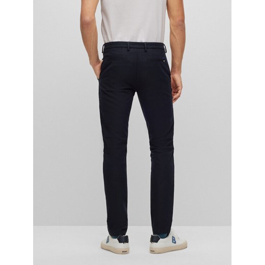 Boss Spodnie materiałowe Kaito1_T 50487754 Granatowy Slim Fit ze sklepu MODIVO w kategorii Spodnie męskie - zdjęcie 182680498