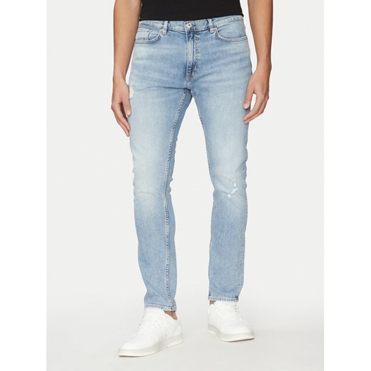 HUGO Jeansy Zane 50529117 Niebieski Extra Slim Fit ze sklepu MODIVO w kategorii Jeansy męskie - zdjęcie 182680679