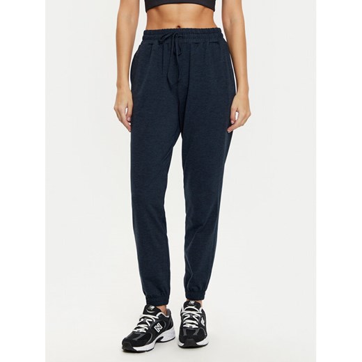 Girlfriend Collective Spodnie dresowe ReSet 6016 Granatowy Slim Fit ze sklepu MODIVO w kategorii Spodnie damskie - zdjęcie 182681237