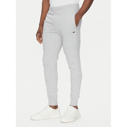 Lacoste Spodnie dresowe XH9624 Szary Regular Fit ze sklepu MODIVO w kategorii Spodnie męskie - zdjęcie 182681967