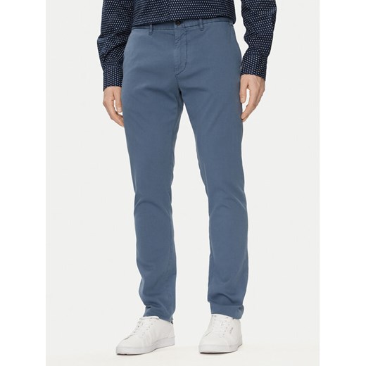 Tommy Hilfiger Chinosy Bleecker MW0MW33910 Niebieski Slim Fit ze sklepu MODIVO w kategorii Spodnie męskie - zdjęcie 182683326