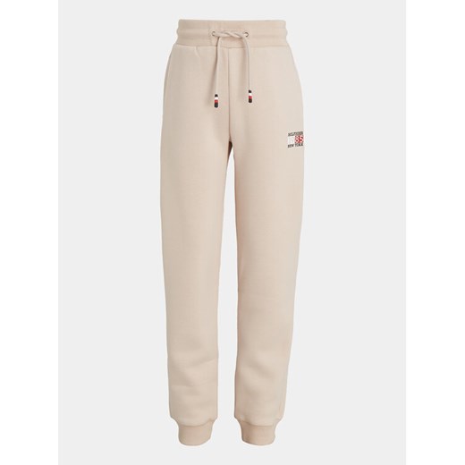Tommy Hilfiger Spodnie dresowe KB0KB08475 S Beżowy Regular Fit ze sklepu MODIVO w kategorii Spodnie chłopięce - zdjęcie 182683526