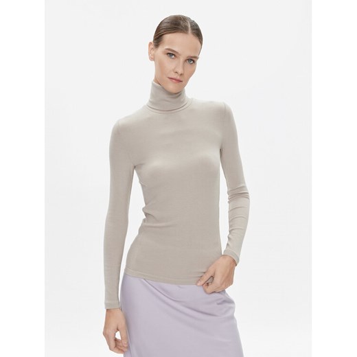 Calvin Klein Golf K20K206053 Beżowy Slim Fit ze sklepu MODIVO w kategorii Bluzki damskie - zdjęcie 182684146
