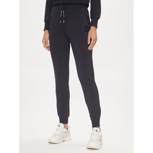 Armani Exchange Spodnie dresowe 3DYP79 YJEPZ 1593 Granatowy Regular Fit ze sklepu MODIVO w kategorii Spodnie damskie - zdjęcie 182684998