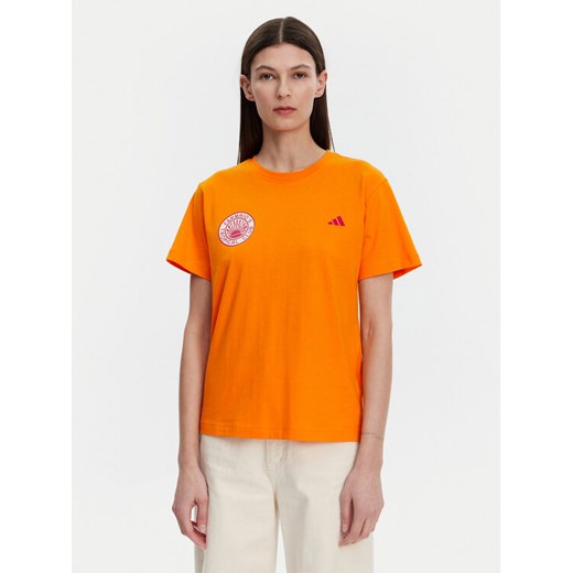 adidas T-Shirt FARM Graphic JD6293 Pomarańczowy Regular Fit ze sklepu MODIVO w kategorii Bluzki damskie - zdjęcie 182689455