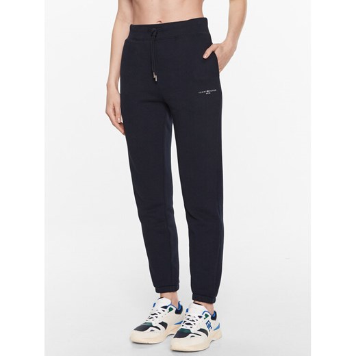 Tommy Hilfiger Spodnie dresowe 1985 WW0WW38690 Granatowy Tapered Fit ze sklepu MODIVO w kategorii Spodnie damskie - zdjęcie 182691736