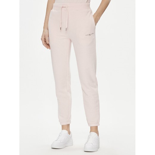Tommy Hilfiger Spodnie dresowe 1985 WW0WW38690 Różowy Tapered Fit ze sklepu MODIVO w kategorii Spodnie damskie - zdjęcie 182691807