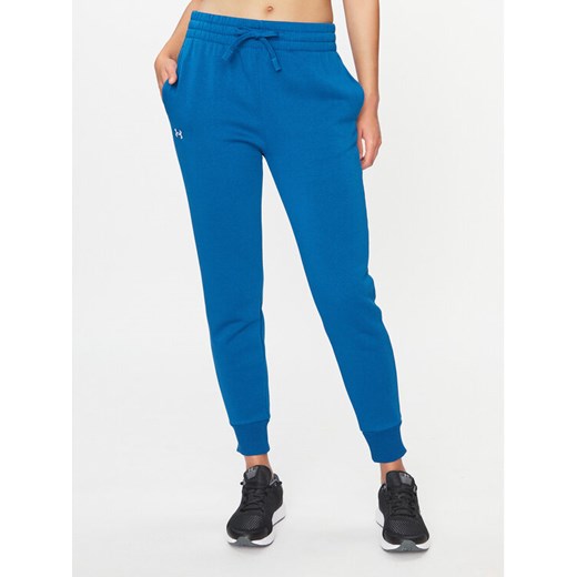 Under Armour Spodnie dresowe Ua Rival Fleece Jogger 1379438 Niebieski Loose Fit ze sklepu MODIVO w kategorii Spodnie damskie - zdjęcie 182692696