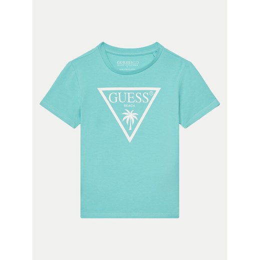 Guess T-Shirt L5GI29 J1314 Turkusowy Regular Fit ze sklepu MODIVO w kategorii T-shirty chłopięce - zdjęcie 182694626