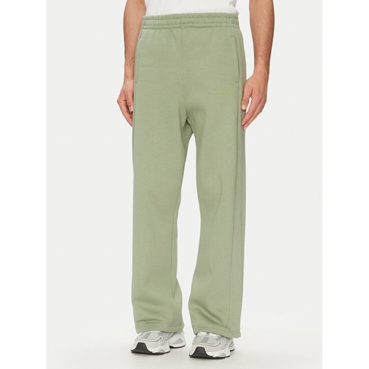Karl Kani Spodnie dresowe Ellipse Straight Leg 60060043 Khaki Relaxed Fit ze sklepu MODIVO w kategorii Spodnie męskie - zdjęcie 182694699