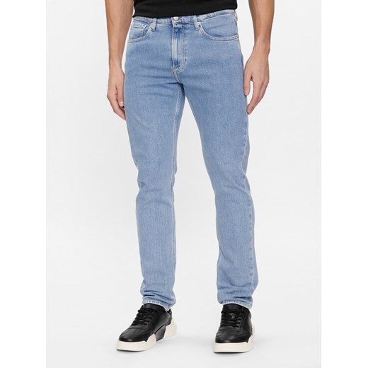 Calvin Klein Jeans Jeansy J30J323690 Niebieski Slim Taper Fit ze sklepu MODIVO w kategorii Jeansy męskie - zdjęcie 182694875