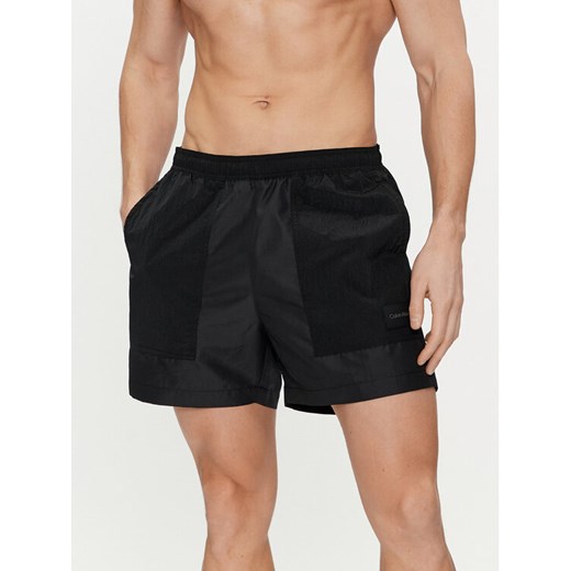 Calvin Klein Swimwear Szorty kąpielowe KM0KM00951 Czarny Regular Fit ze sklepu MODIVO w kategorii Kąpielówki - zdjęcie 182695088