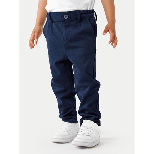 NAME IT Spodnie materiałowe 13223128 Granatowy Regular Fit ze sklepu MODIVO w kategorii Spodnie chłopięce - zdjęcie 182695978
