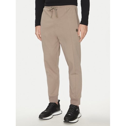 BOSS Spodnie dresowe Hadiko TL 50543434 Zielony Regular Fit ze sklepu MODIVO w kategorii Spodnie męskie - zdjęcie 182696026
