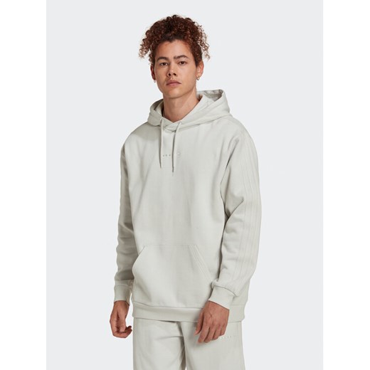 adidas Bluza Reveal Ess HK2725 Beżowy Loose Fit ze sklepu MODIVO w kategorii Bluzy męskie - zdjęcie 182697418