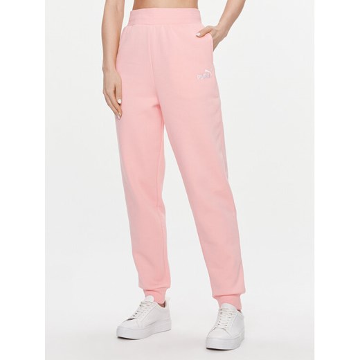 Puma Spodnie dresowe Ess+ Embroidery 670007 Różowy Regular Fit ze sklepu MODIVO w kategorii Spodnie damskie - zdjęcie 182698136