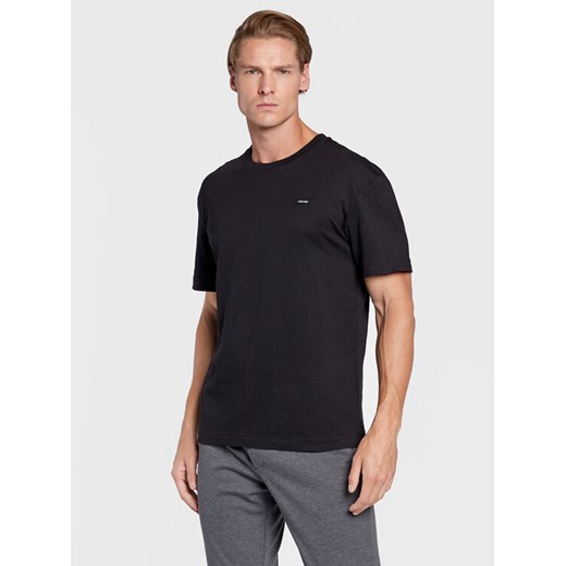 Calvin Klein T-Shirt K10K110669 Czarny Regular Fit ze sklepu MODIVO w kategorii T-shirty męskie - zdjęcie 182699338