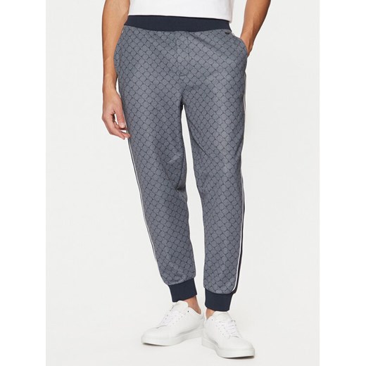 JOOP! Spodnie dresowe JJ-18Talib 30044679 Niebieski Regular Fit ze sklepu MODIVO w kategorii Spodnie męskie - zdjęcie 182699677