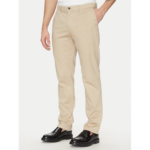 Tommy Hilfiger Chinosy Denton MW0MW37717 Beżowy Slim Fit ze sklepu MODIVO w kategorii Spodnie męskie - zdjęcie 182700206