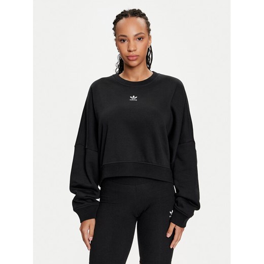 adidas Bluza Essentials IW0953 Czarny Loose Fit ze sklepu MODIVO w kategorii Bluzy damskie - zdjęcie 182700405