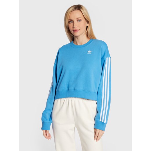 adidas Bluza Allover Print HN3641 Niebieski Relaxed Fit ze sklepu MODIVO w kategorii Bluzy damskie - zdjęcie 182700457