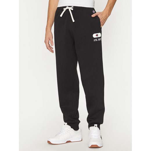 Champion Spodnie dresowe 220434 Czarny Loose Fit ze sklepu MODIVO w kategorii Spodnie męskie - zdjęcie 182702186