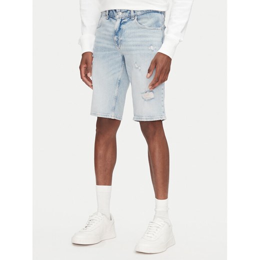 Tommy Jeans Szorty jeansowe Ronnie DM0DM21300 Niebieski Regular Fit ze sklepu MODIVO w kategorii Spodenki męskie - zdjęcie 182702239