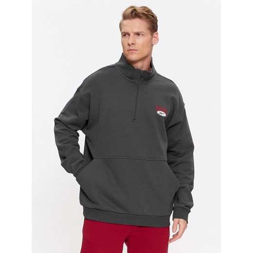 Reebok Bluza Archive Essentials IL8801 Szary Regular Fit ze sklepu MODIVO w kategorii Bluzy męskie - zdjęcie 182704367
