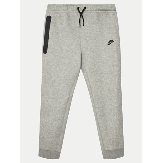 Nike Spodnie dresowe FD3287 Szary Standard Fit ze sklepu MODIVO w kategorii Spodnie chłopięce - zdjęcie 182705138