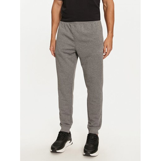 Calvin Klein Performance Spodnie dresowe 00GMS4P634 Szary Regular Fit ze sklepu MODIVO w kategorii Spodnie męskie - zdjęcie 182705845