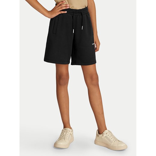 Calvin Klein Jeans Szorty sportowe New Inst. Logo IU0IU00703 Czarny Relaxed Fit ze sklepu MODIVO w kategorii Spodenki dziewczęce - zdjęcie 182707108