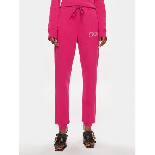 Versace Jeans Couture Spodnie dresowe 76HAAT01 Różowy Regular Fit ze sklepu MODIVO w kategorii Spodnie damskie - zdjęcie 182707409