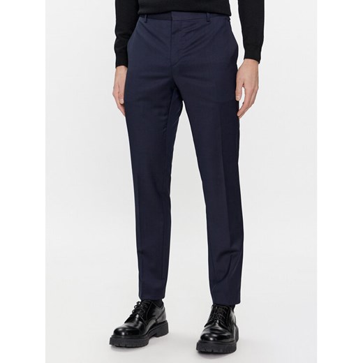 Calvin Klein Chinosy K10K112292 Granatowy Slim Fit ze sklepu MODIVO w kategorii Spodnie męskie - zdjęcie 182707477