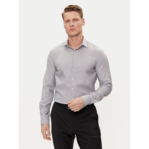 Calvin Klein Koszula K10K112588 Granatowy Slim Fit ze sklepu MODIVO w kategorii Koszule męskie - zdjęcie 182708806