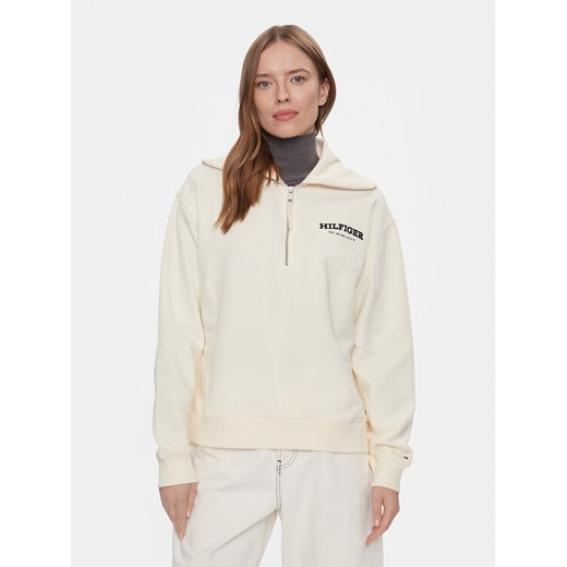 Tommy Hilfiger Bluza Monotype WW0WW42469 Beżowy Regular Fit ze sklepu MODIVO w kategorii Bluzy damskie - zdjęcie 182709177