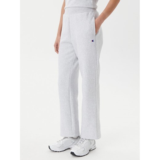 Champion Spodnie dresowe 117983 Szary Slim Fit ze sklepu MODIVO w kategorii Spodnie damskie - zdjęcie 182709237