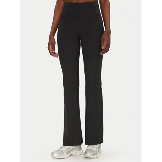Girlfriend Collective Legginsy Rib Flare 4038RIB Czarny Slim Fit ze sklepu MODIVO w kategorii Spodnie damskie - zdjęcie 182709919