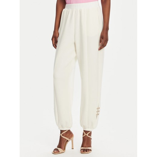 Liu Jo Sport Spodnie dresowe TA5229 J4869 Biały Relaxed Fit ze sklepu MODIVO w kategorii Spodnie damskie - zdjęcie 182711229