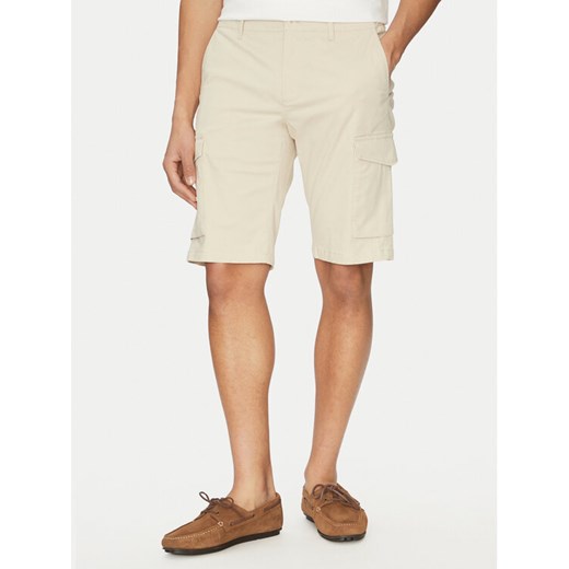Tommy Hilfiger Szorty materiałowe John MW0MW31244 Beżowy Regular Fit ze sklepu MODIVO w kategorii Spodenki męskie - zdjęcie 182711348