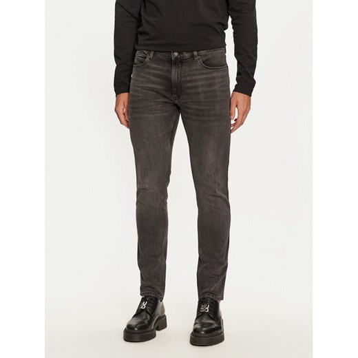 Hugo Jeansy 734 50522140 Czarny Extra Slim Fit ze sklepu MODIVO w kategorii Jeansy męskie - zdjęcie 182713447