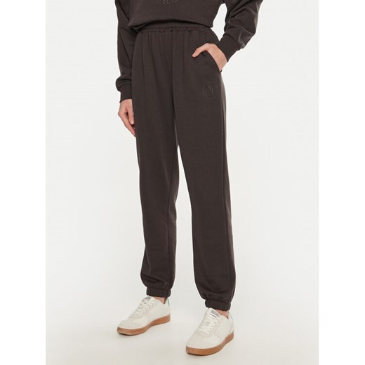 Athlecia Spodnie dresowe Damla EA243322 Brązowy Loose Fit ze sklepu MODIVO w kategorii Spodnie damskie - zdjęcie 182713549