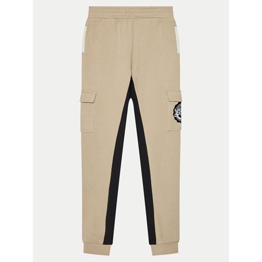 Guess Spodnie dresowe L4YQ12 KA6R4 Beżowy Regular Fit ze sklepu MODIVO w kategorii Spodnie chłopięce - zdjęcie 182714188