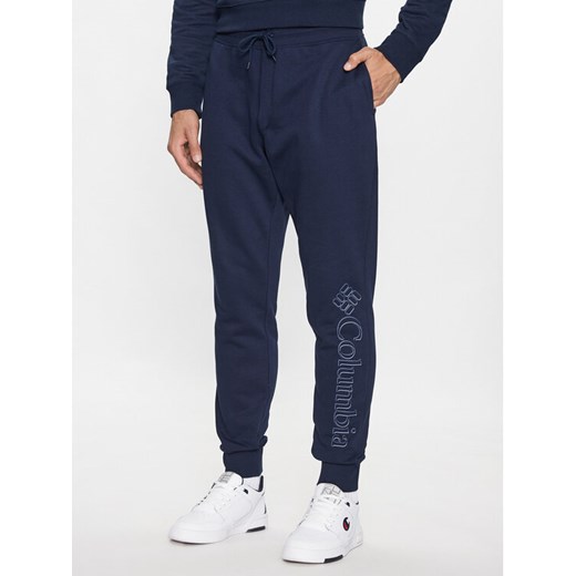 Columbia Spodnie dresowe M CSC Logo™ Fleece Jogger II Niebieski Regular Fit ze sklepu MODIVO w kategorii Spodnie męskie - zdjęcie 182714905