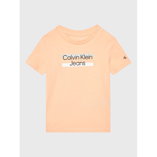 Calvin Klein Jeans T-Shirt Hero Logo IN0IN00068 Pomarańczowy Regular Fit ze sklepu MODIVO w kategorii T-shirty chłopięce - zdjęcie 182714965