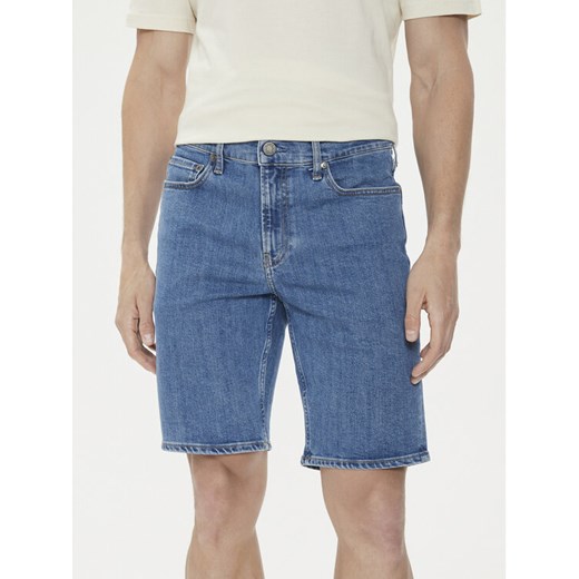 Calvin Klein Szorty jeansowe K10K112941 Niebieski Slim Fit ze sklepu MODIVO w kategorii Spodenki męskie - zdjęcie 182716266