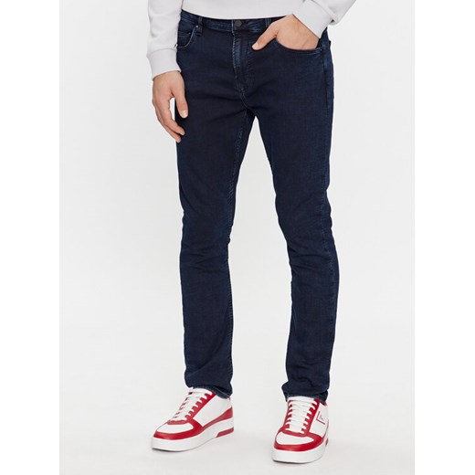 Guess Jeansy M4RA27 D58P1 Granatowy Super Skinny Fit ze sklepu MODIVO w kategorii Jeansy męskie - zdjęcie 182717066