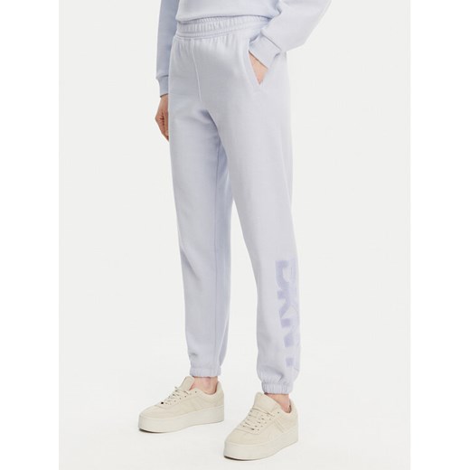 DKNY Spodnie dresowe DP5P3585 Błękitny Regular Fit ze sklepu MODIVO w kategorii Spodnie damskie - zdjęcie 182717099