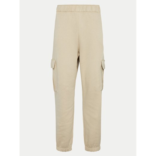 Champion Spodnie dresowe 117554 Beżowy Loose Fit ze sklepu MODIVO w kategorii Spodnie damskie - zdjęcie 182717629