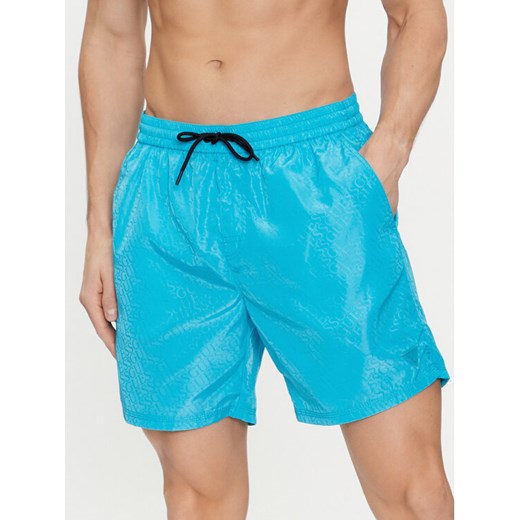 Guess Szorty kąpielowe F4GT05 WG292 Niebieski Regular Fit ze sklepu MODIVO w kategorii Kąpielówki - zdjęcie 182718418