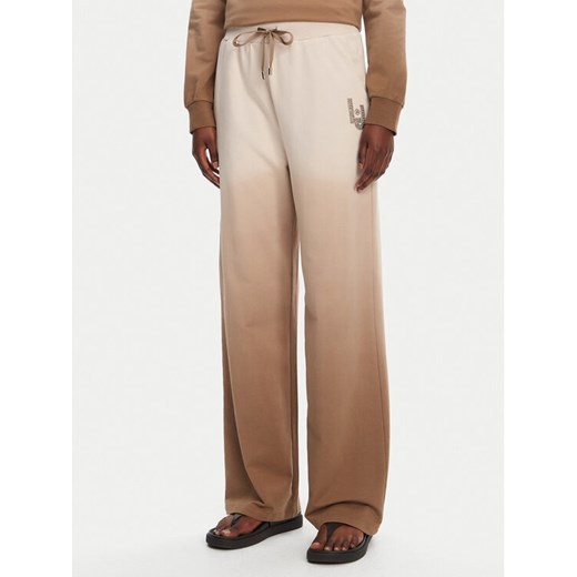 Liu Jo Sport Spodnie dresowe TA5116 FS090 Beżowy Relaxed Fit ze sklepu MODIVO w kategorii Spodnie damskie - zdjęcie 182718937